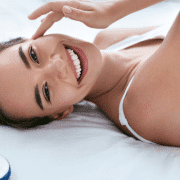 woman gets clear skin by drinking water