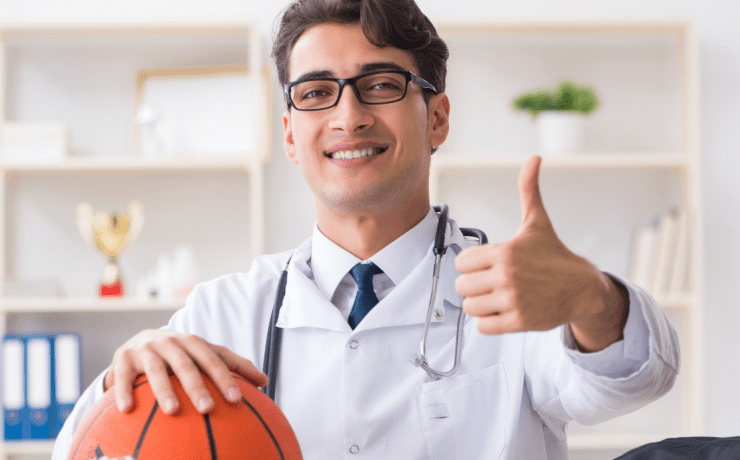 young male physician specializes in treating athletes and sports injuries