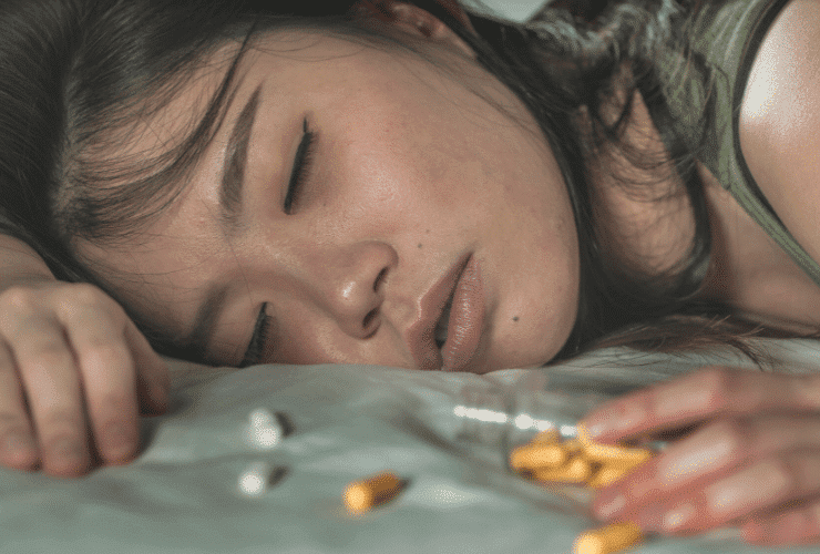 young asian woman overdosing on addictive pills and heroin