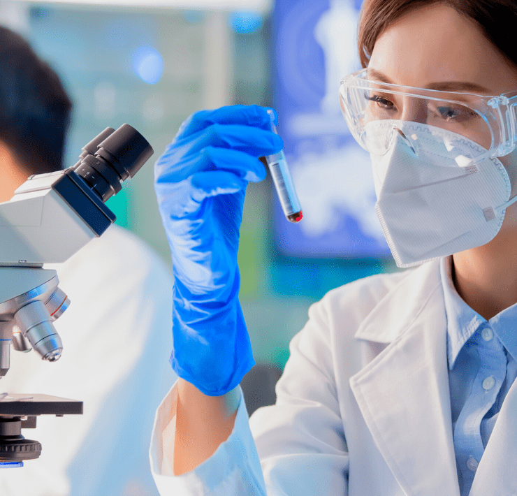 young asian scientist studying c-protein blood test